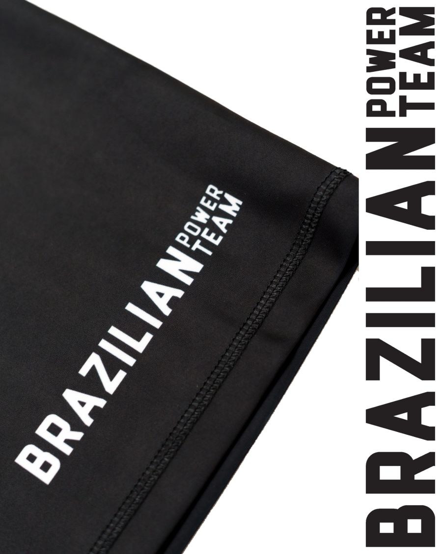 Black BPT grappling shorts with Brazilian Power Team print.